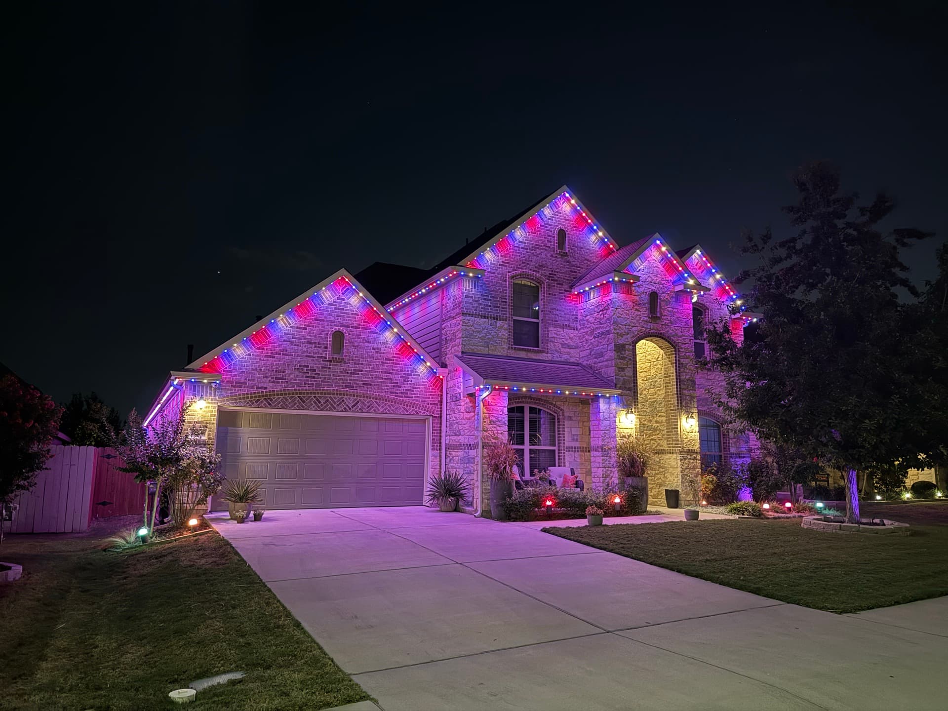 Clean permanent LED lighting installation meeting HOA guidelines on an Austin home