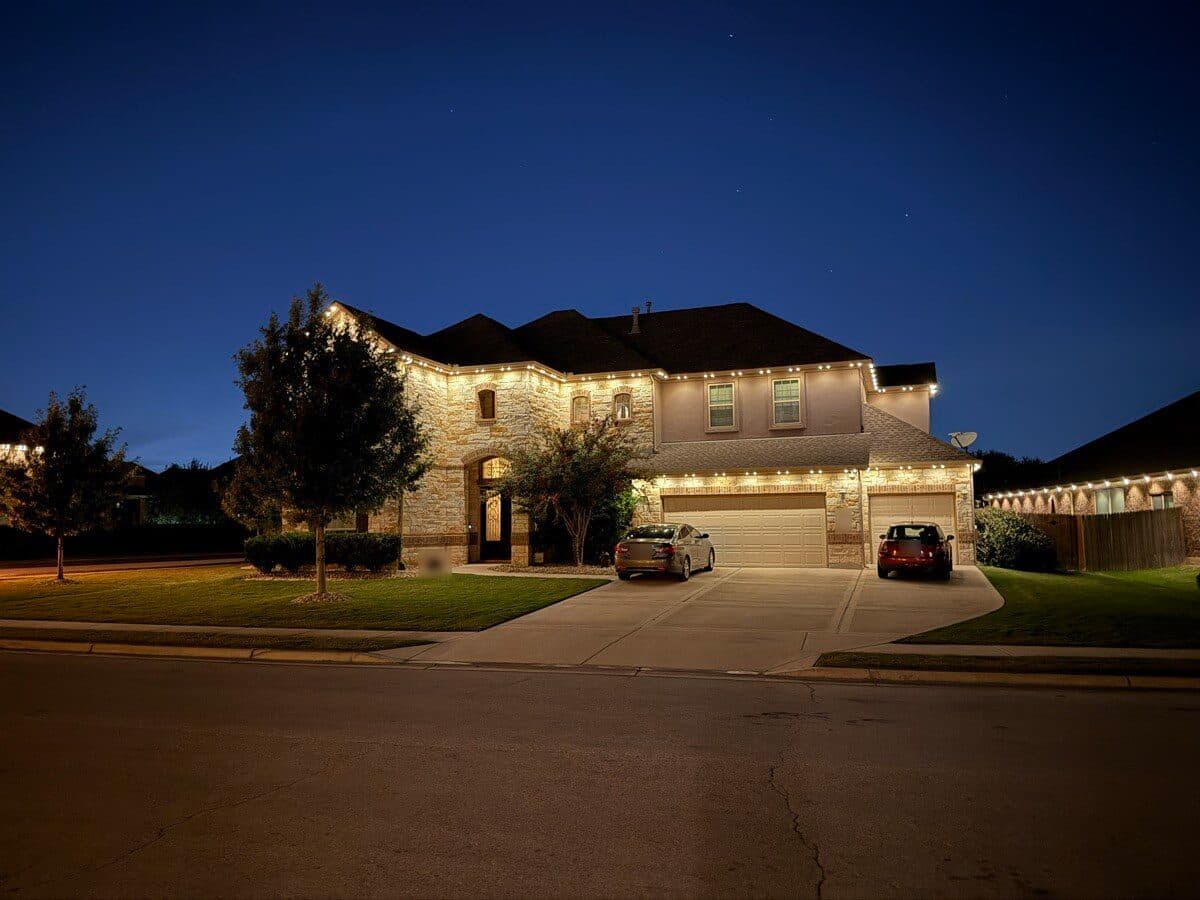 TruLight permanent lighting on Austin home at dusk