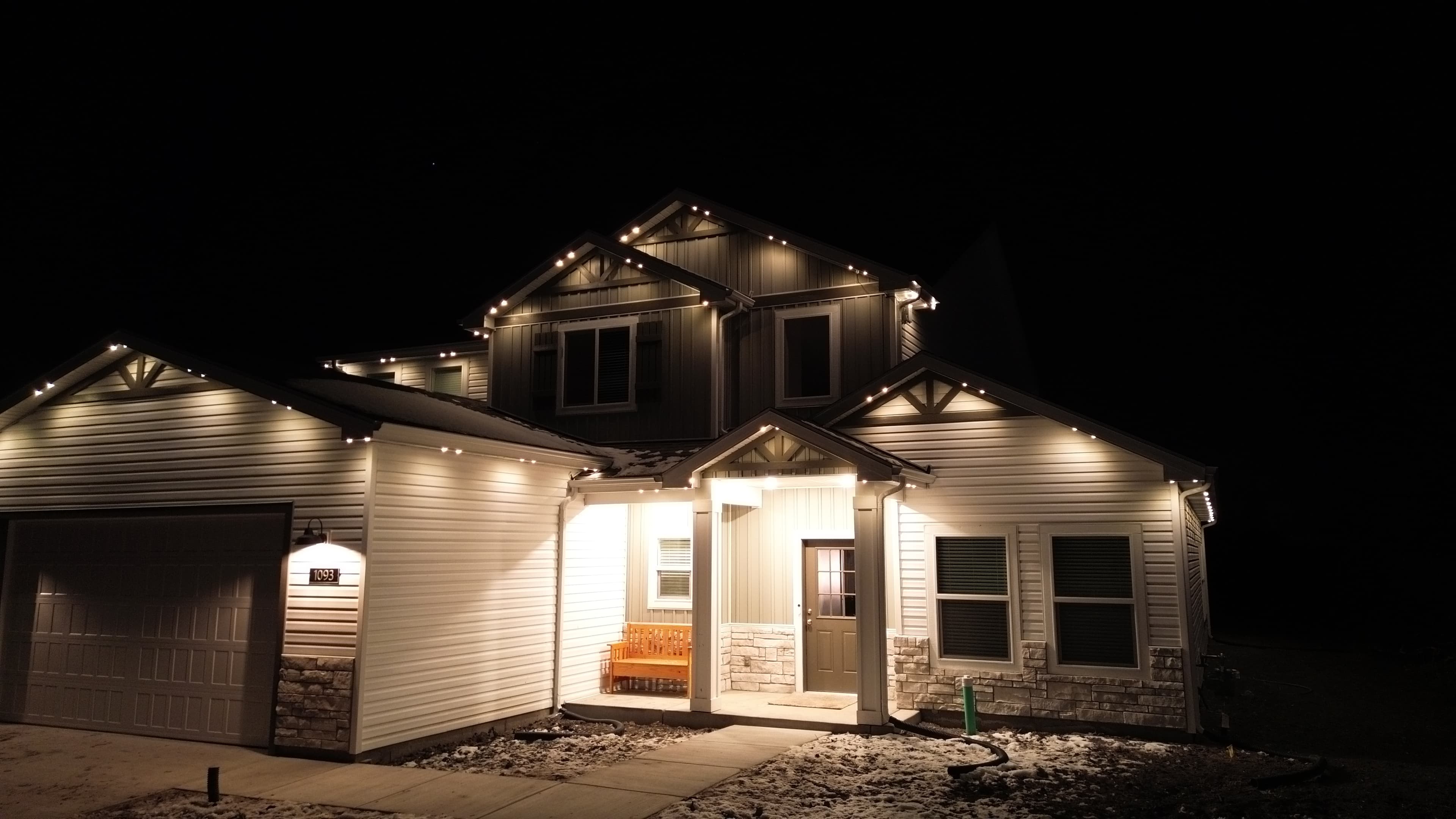 Permanent LED roofline lighting on a Hill Country limestone home in Boerne, Texas