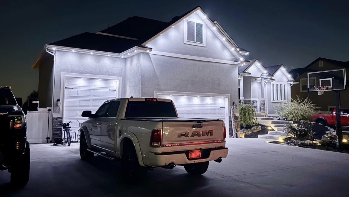 Austin limestone home illuminated with TruLight RGBW pure white permanent lighting showing how dedicated warm-white LEDs produce clean true white